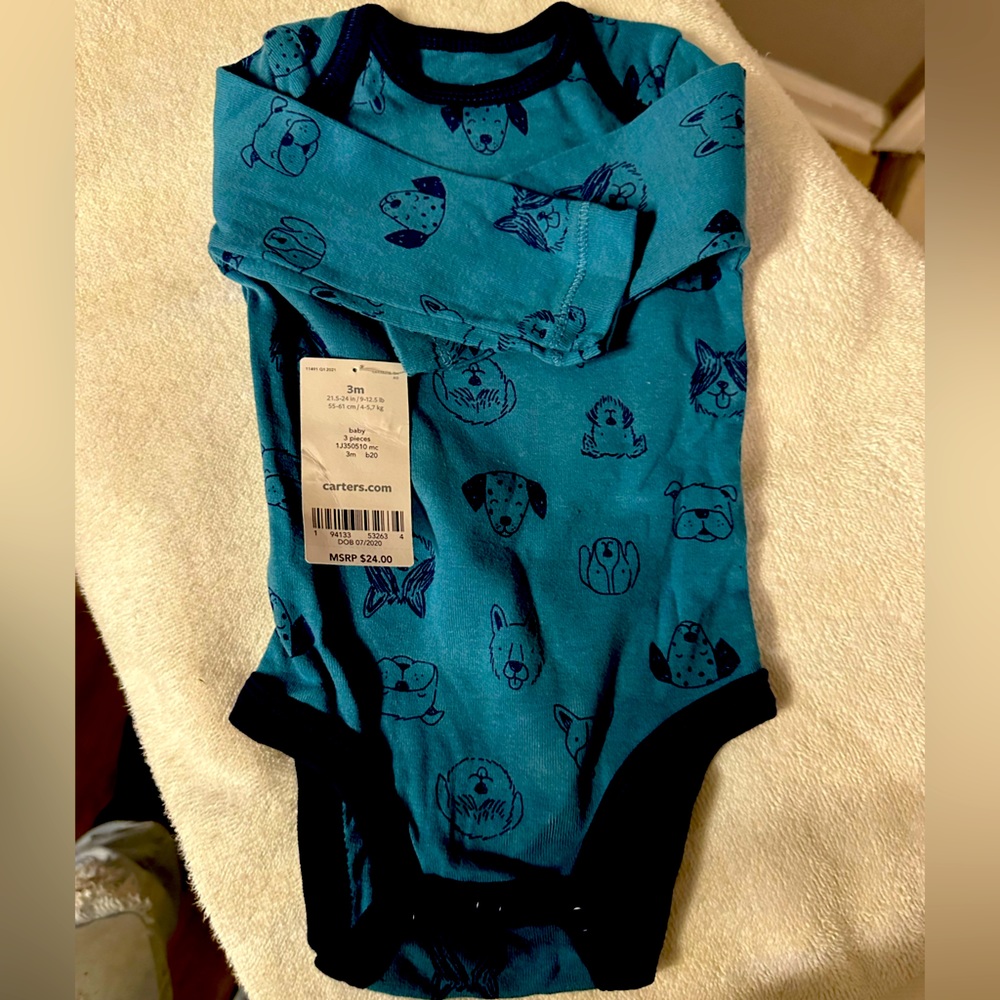 Long sleeve onesie with puppies on it